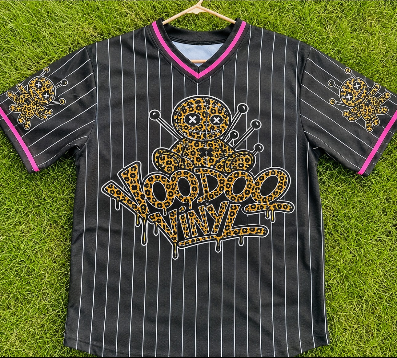 Sold black pinstripe Voodoo Vinyl jersey with leopard print voodoo doll artwork