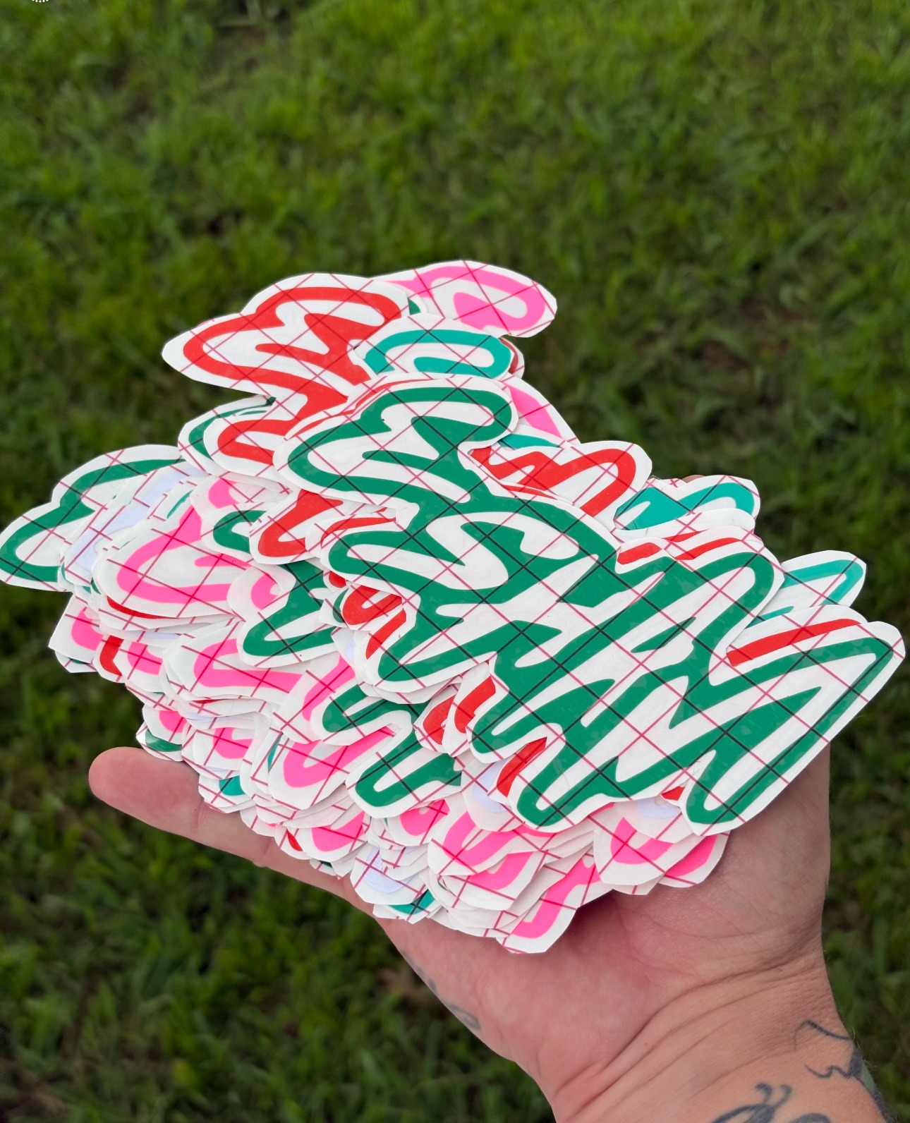 Stack of colorful Voodoo Vinyl die-cut stickers